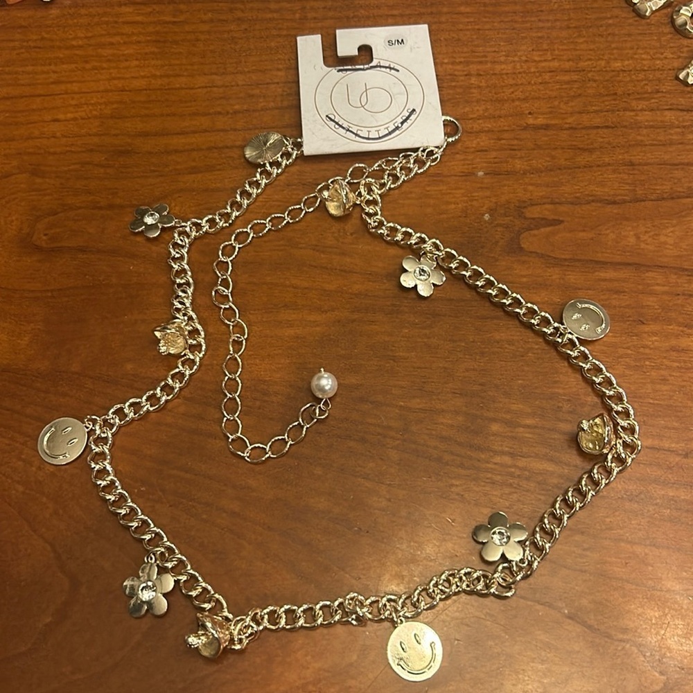 Urban Outfitters Silver chain belt with happy faces mushrooms and flowers. NEW